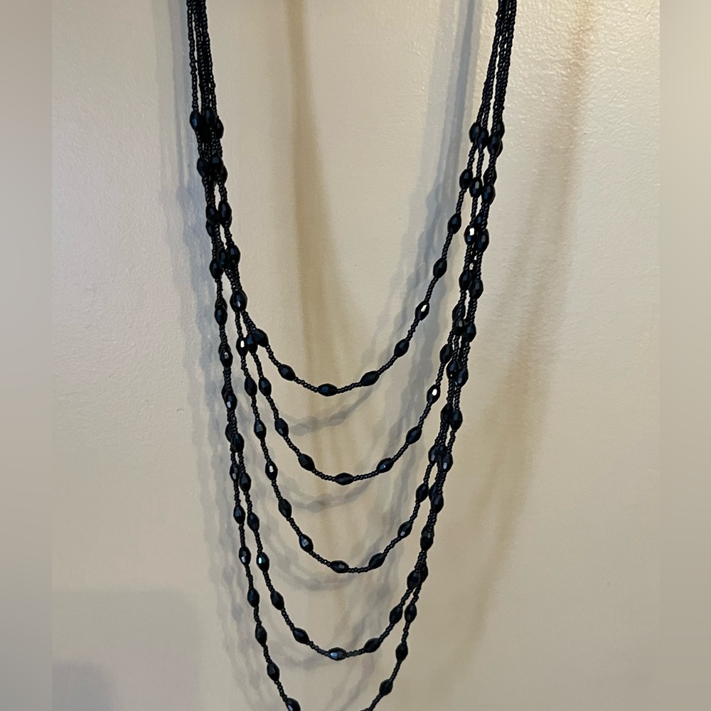 5 strand necklace with black crystal beads